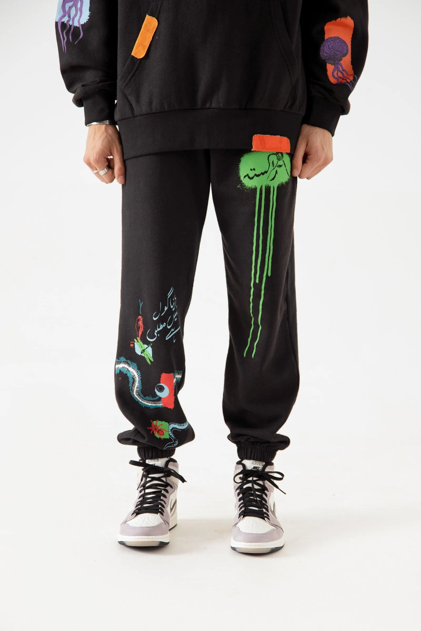 "DISTORTION AMONG US" HAND PRINTED SWEATPANTS