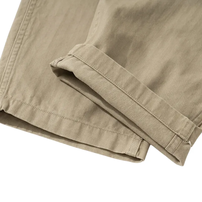 Relaxed fit pleated herringbone chino pant